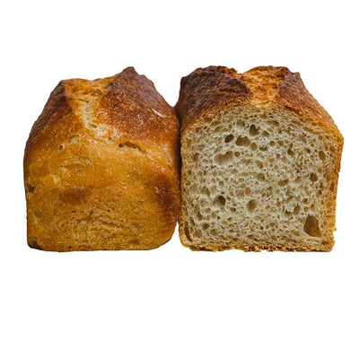 Angeschnitte Weissbrotstange von zwei Seiten - backverliebt.com